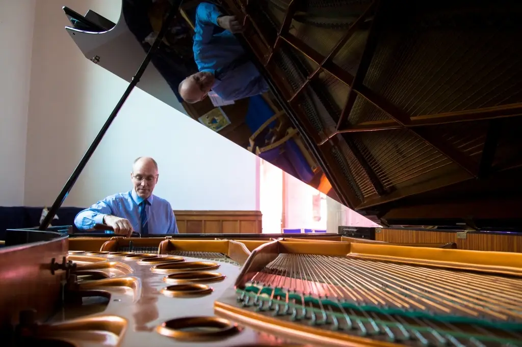 Paul Fox tuning a Bosendorfer piano